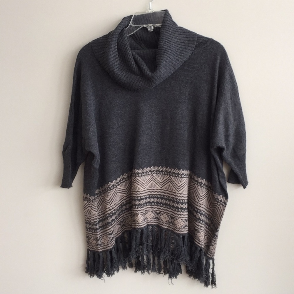 Ladies cowl neck sweater with fringe!